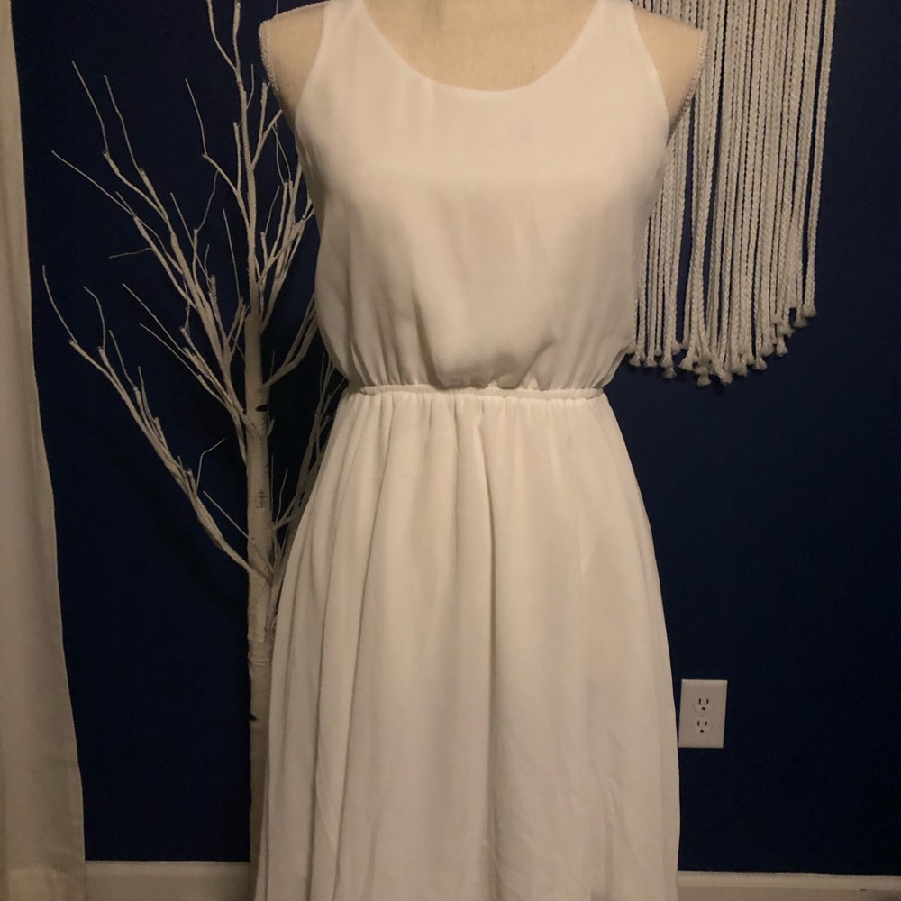 Flowy Against Nudity Sleeveless Dress NWT